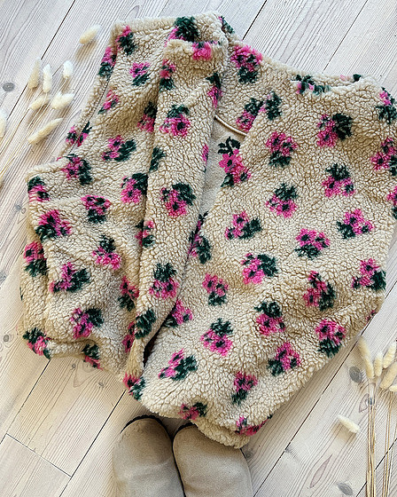 Teddyfell-Weste mit Blumenmuster in beige