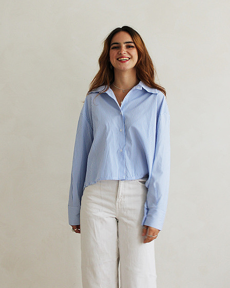 blue and white striped blouse with bow on the back