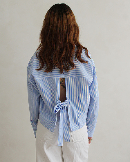 blue and white striped blouse with bow on the back