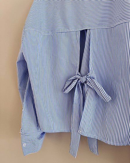 blue and white striped blouse with bow on the back